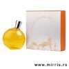 Bočica ženskog mirisa Hermes Elixir Des Merveilles pored kutije