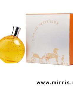 Bočica ženskog mirisa Hermes Elixir Des Merveilles pored kutije