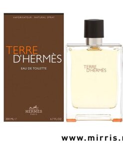 Bočica muškog parfema Hermes Terre d'Hermes pored originalne kutije