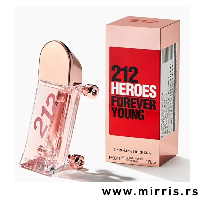 Roze bočica parfema Carolina Herrera 212 Heroes Forever Young pored originalne kutije